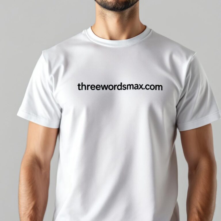 Man wearing a white t-shirt that says threewordsmax.com